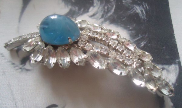 SOLD DeLizza and Elster a/k/a Juliana Flawed Glass Steel Blue Oval Domed Cabochon and Rhinestone Leaf Figural Brooch VERY RARE SOLD